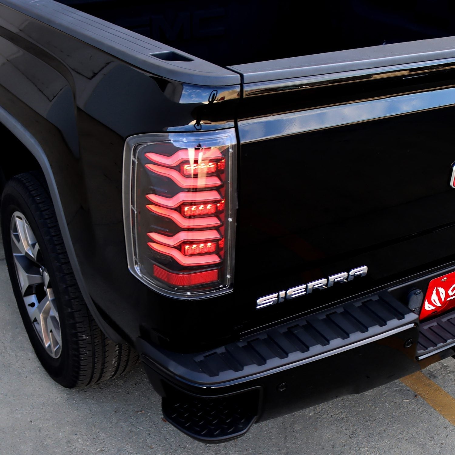 14-18 GMC Sierra 1500/2500HD/3500HD LUXX-Series LED Tail Lights Black-Red | AlphaRex