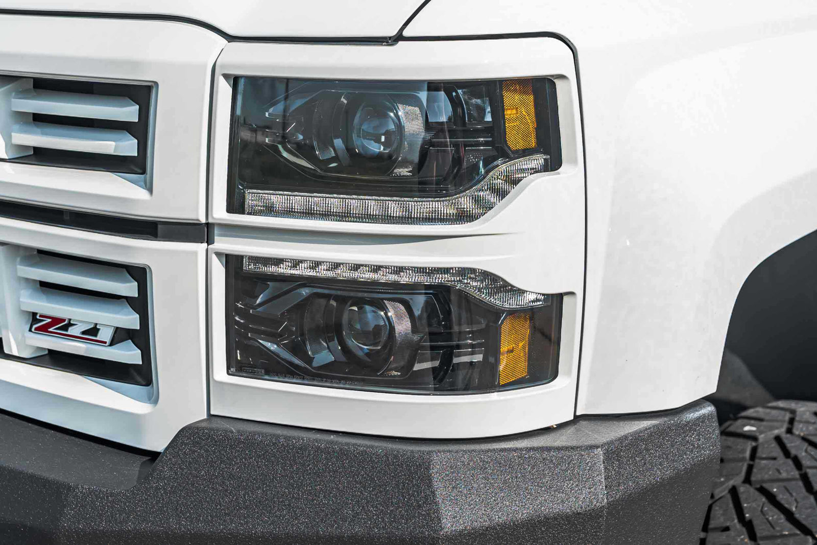 14-15 Silverado 1500 Heads Unfinished Bezel and Red Tails OE LED Tails