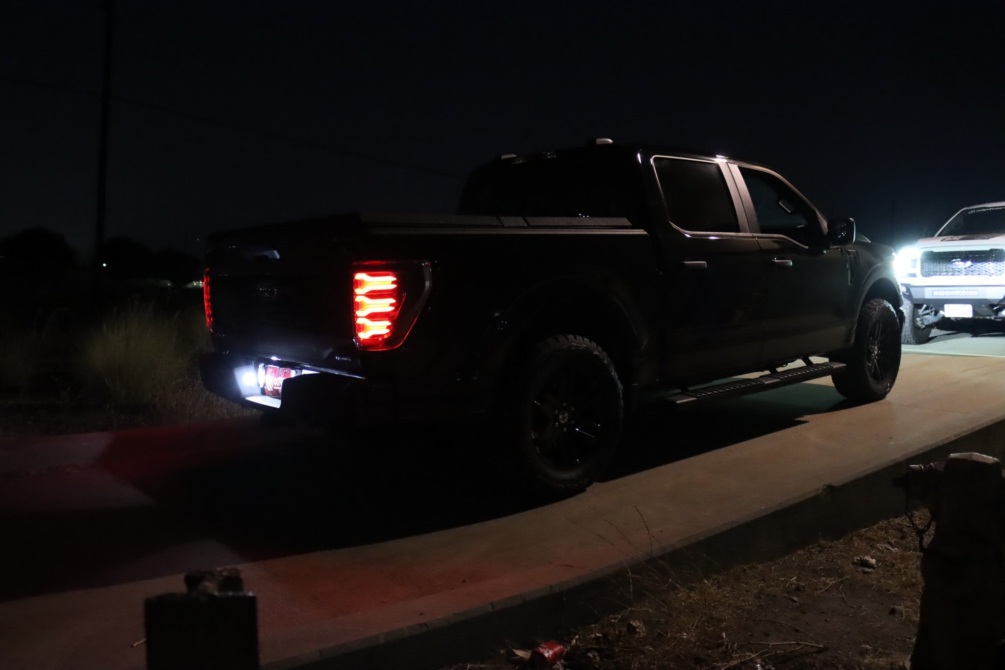 21-23 Ford F150 LUXX-Series LED Tail Lights Black | AlphaRex