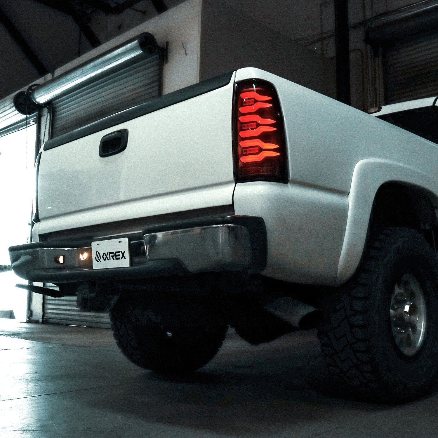 99-06 Chevrolet Silverado/99-06 GMC Sierra LUXX-Series LED Tail Lights Black Red | AlphaRex