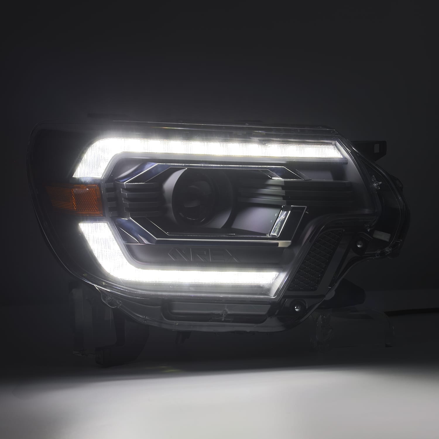 12-15 Toyota Tacoma PRO-Series Halogen Projector Headlights Alpha-Black - Legends Auto Parts