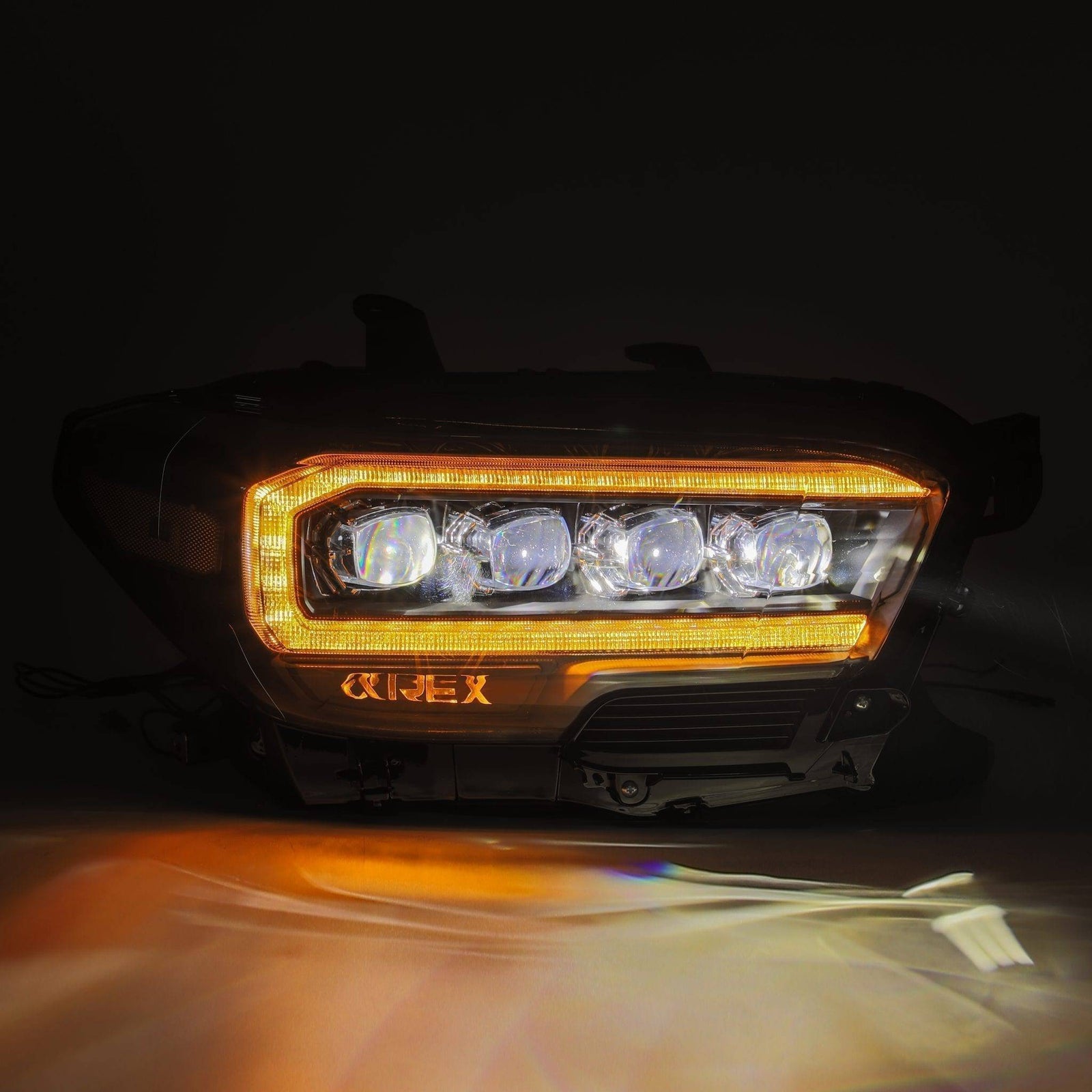 16-23 Toyota Tacoma NOVA-Series LED Projector Headlights Alpha-Black - Legends Auto Parts