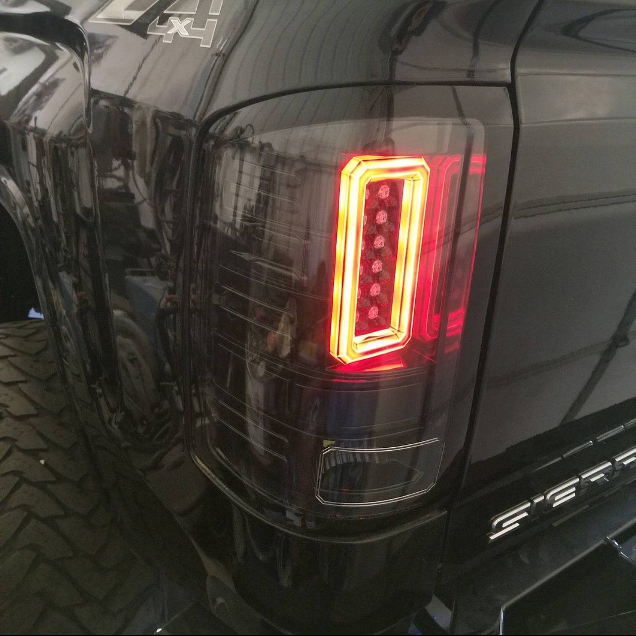 2014-2019 GMC Sierra 1500/2500/3500 RECON Clear Lens (Paintable) OLED Tail Lights (Replaces Factory Halogen Tail Lights)