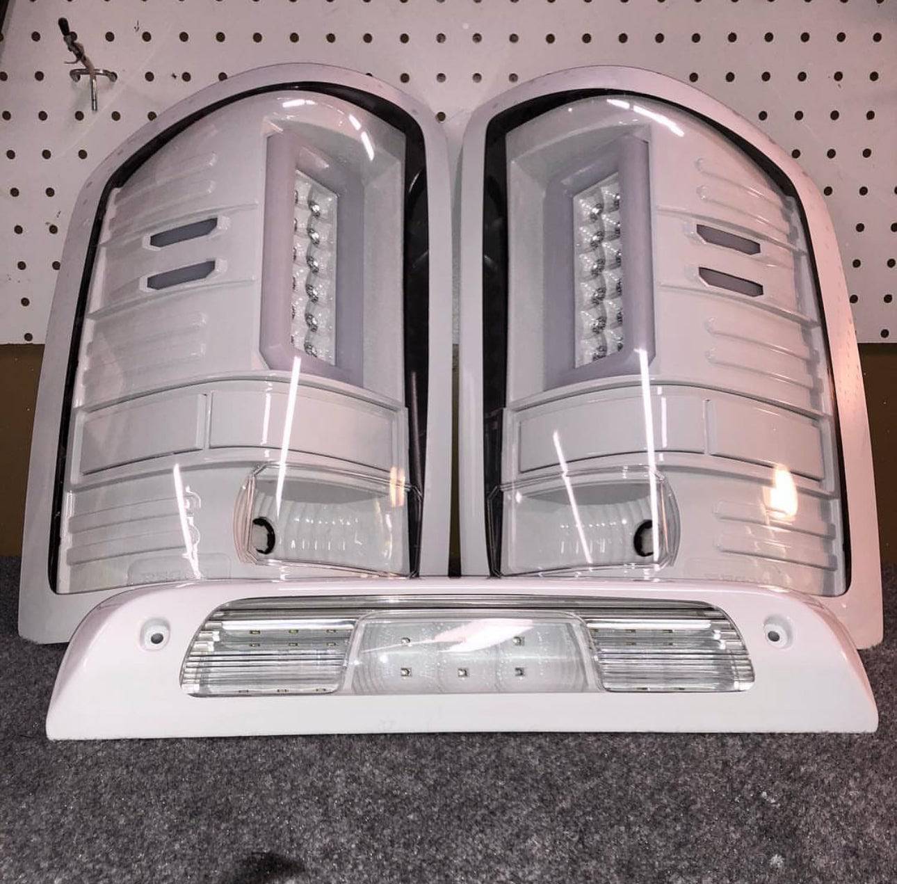 2014-2019 GMC Sierra 1500/2500/3500 RECON Clear Lens (Paintable) OLED Tail Lights (Replaces Factory Halogen Tail Lights)